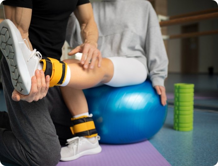 A physiotherapist at Physio Rooms Cork treating a patient during a session